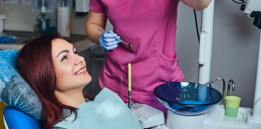 A lady in clinic for Proffesional teeth cleaning