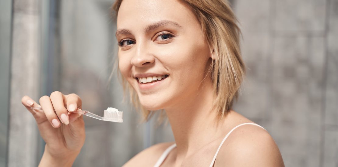 woman looking after her oral well-being