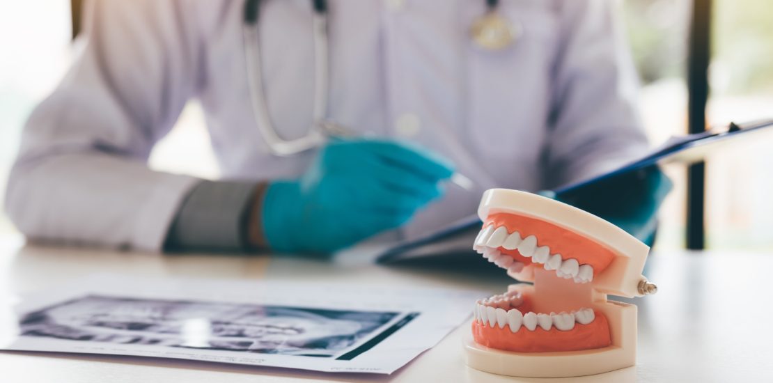 dentist trying to resolve dental issues