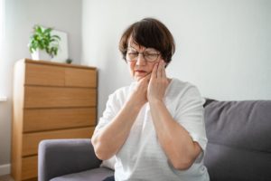 elderly woman with tooth sensitivity