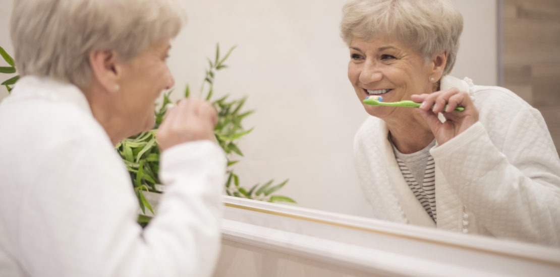 brushing teeth front mirror