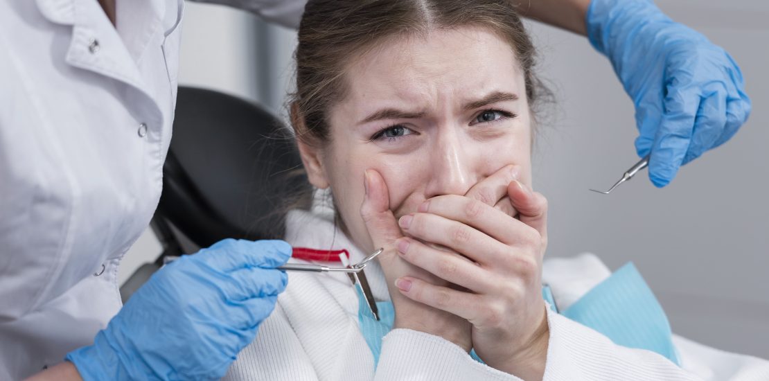 sad woman with tooth pain