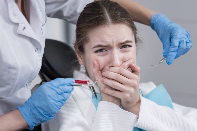Cheadle 15 sad woman with tooth pain