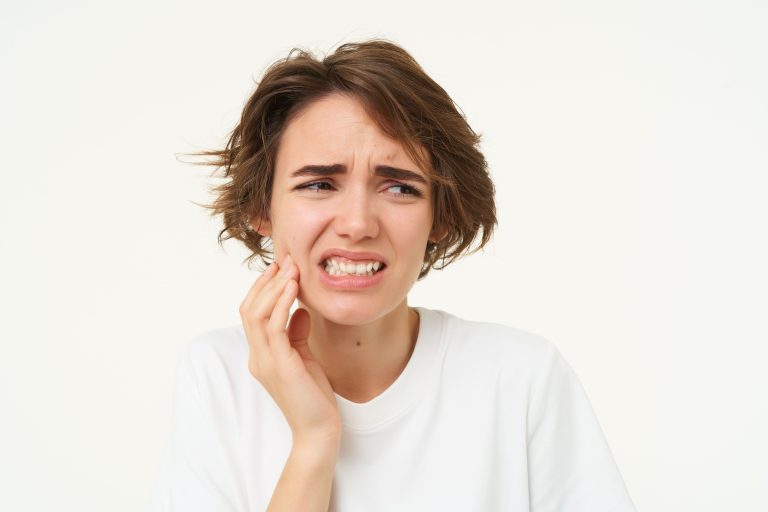woman having tooth pain
